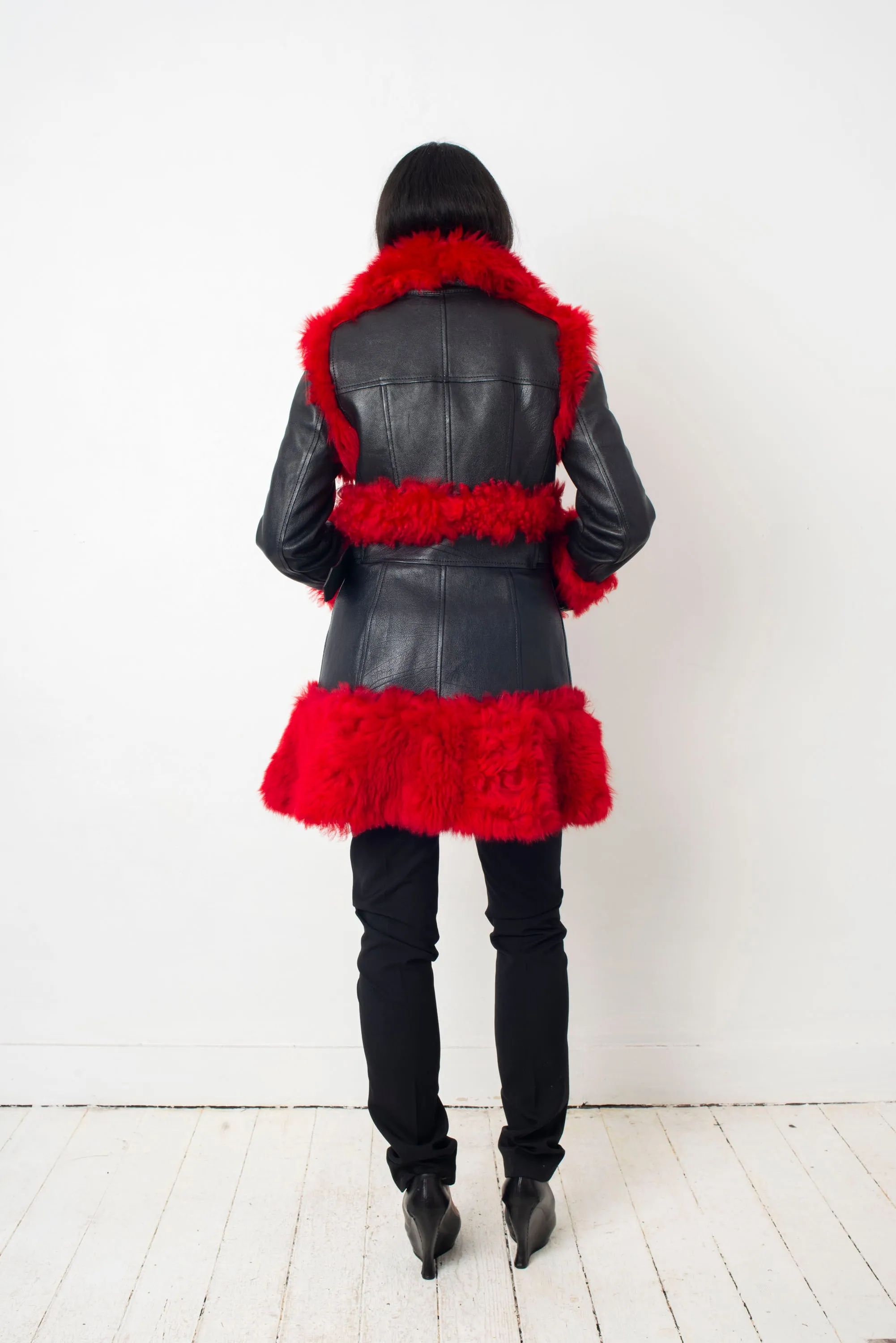 Alexander McQueen FW 2017 black leather and red dyed shearling fur paneled coat